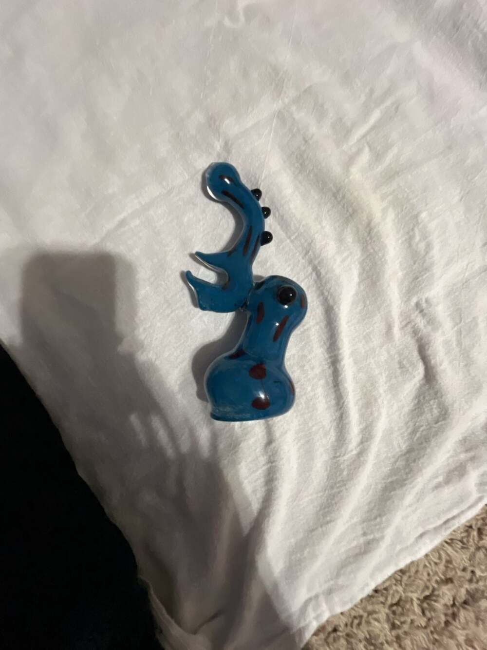 Blue and Red Spotted Glass Character Hand Piece